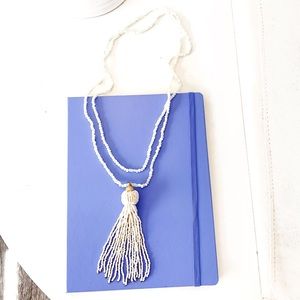 Charming Charlie beaded white tassel necklace